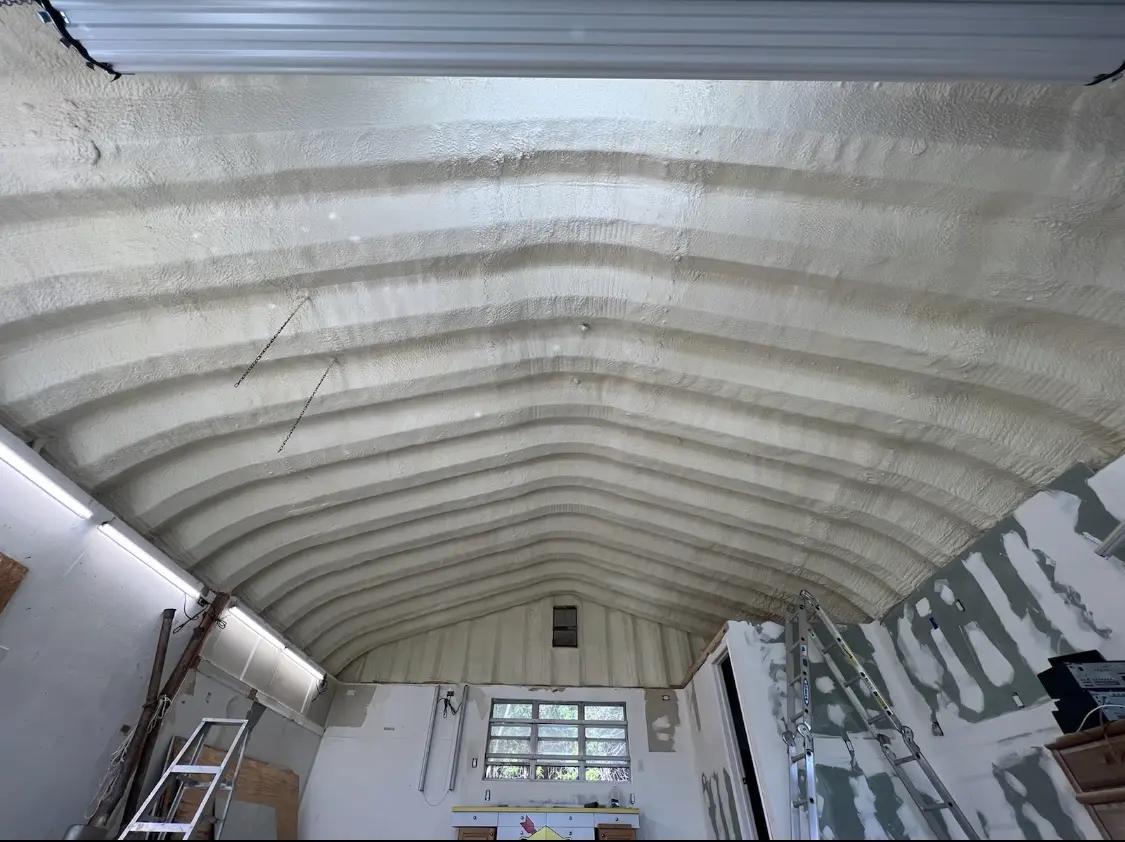 Spray polyurethane foam applied to the underside of a metal roof deck in Sun City